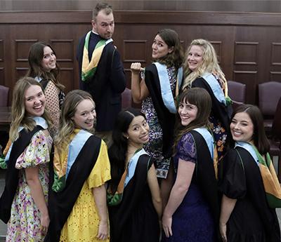 HESA graduates at hooding ceremony